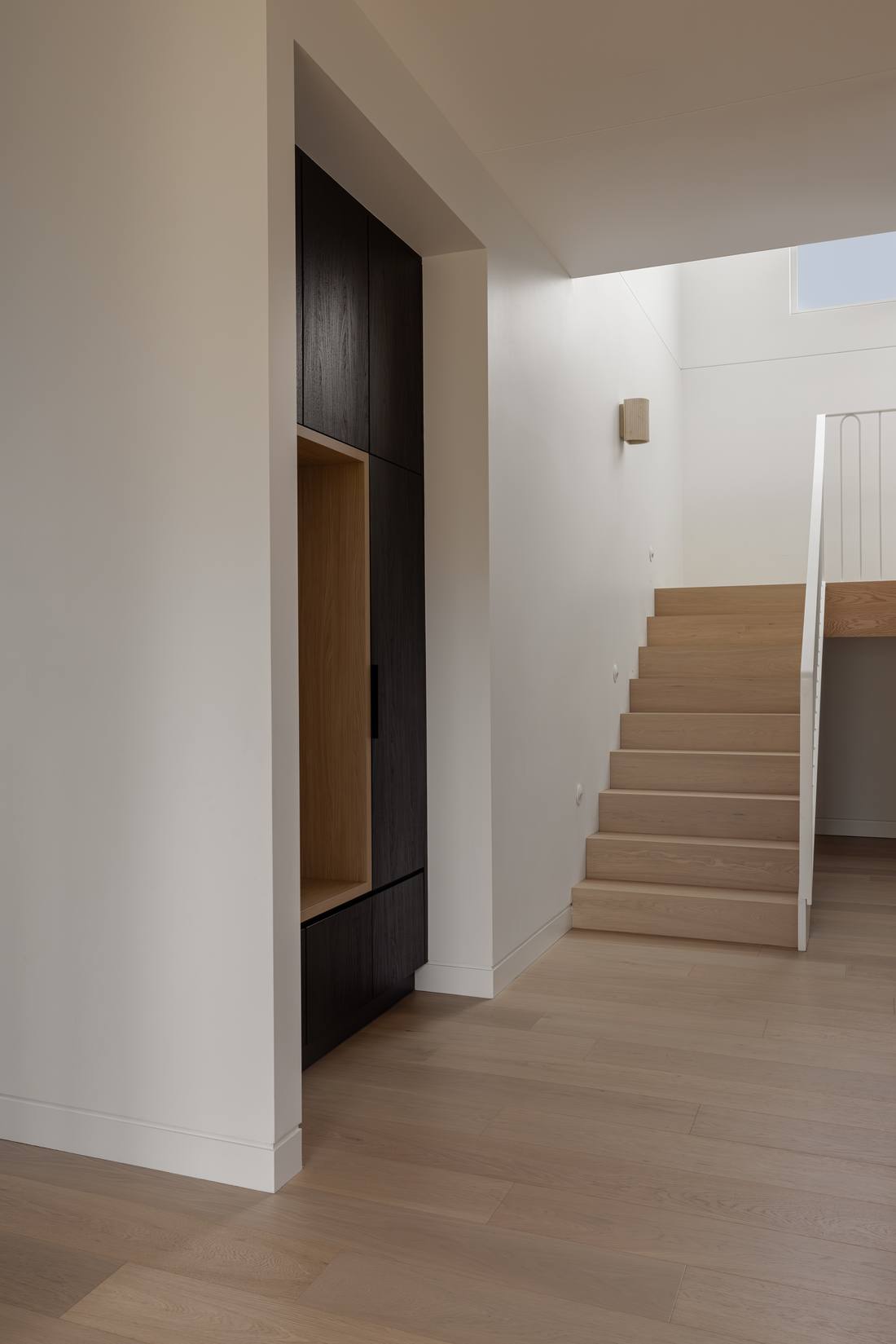 Staircase and hallway finished in engineered oak timber flooring